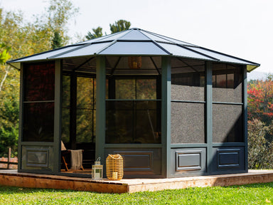 Hexagonal garden gazebo with a metal roof in a garden setting