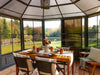 Gazebo Penguin sunroom with a breakfast table set up