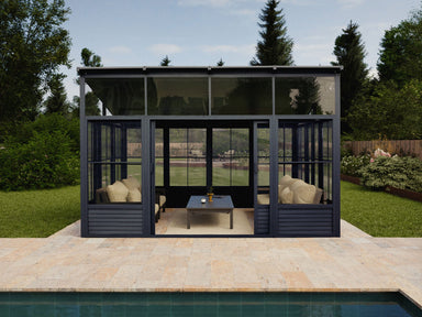 Modern garden room with glass walls in a backyard setting.